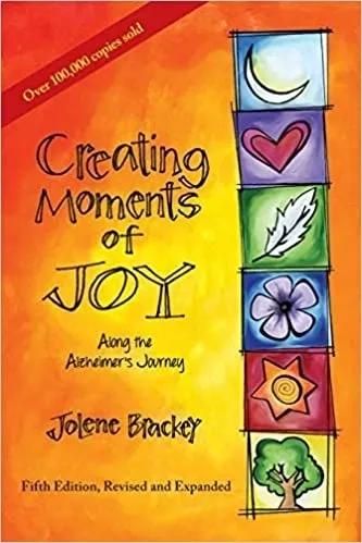 A book cover with the title of creating moments of joy.